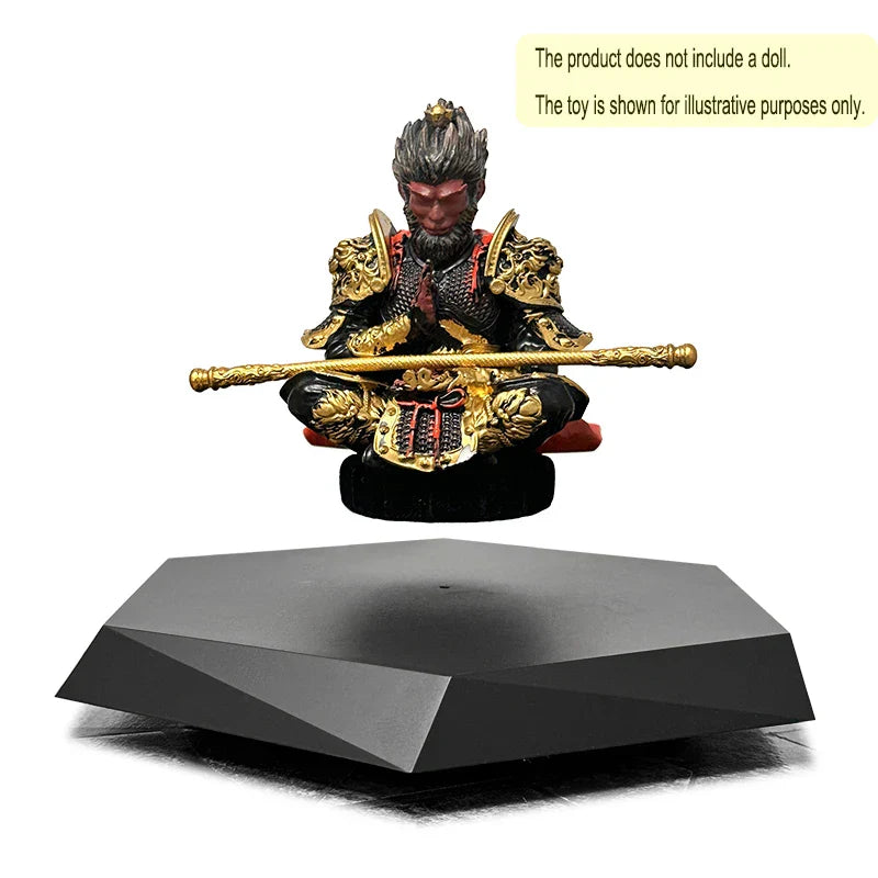 A golden and black armored monkey figurine with red face seated cross-legged on a magnetic suspension display stand for collectibles jewelry hand-made doll display