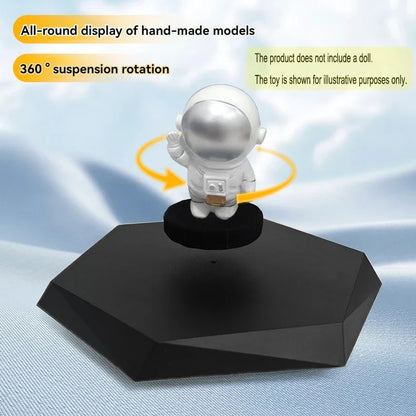 Silver astronaut figurine suspended on a black hexagonal magnetic suspension display stand for collectibles jewelry hand-made doll display