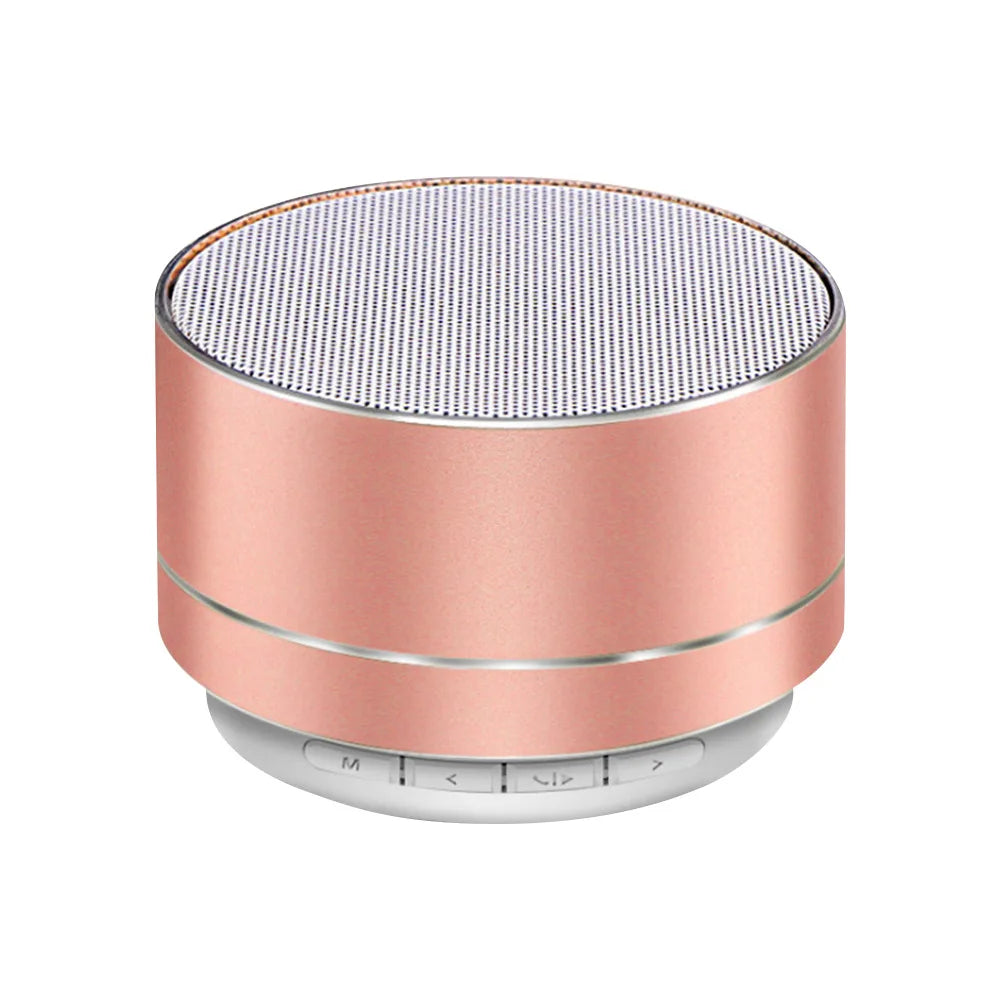Rose gold cylindrical a10 portable bluetooth speaker with silver mesh grille supports tf card for perfect sound quality