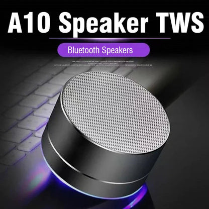 Silver cylindrical a10 portable bluetooth speaker with mesh grille glowing blue led ring supports tf card for perfect sound