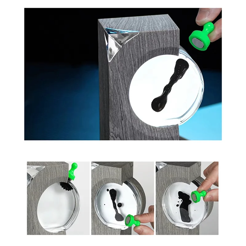 Green magnetic ink stamp with rounded handle for black ink patterns in ferrofluid music rhythm magnetic liquid pickup equipment visual