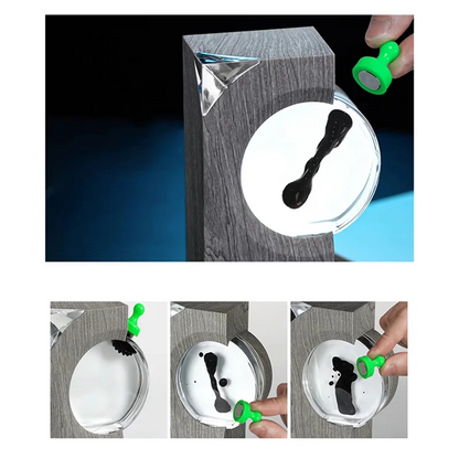 Green magnetic ink stamp with rounded handle for black ink patterns in ferrofluid music rhythm magnetic liquid pickup equipment visual
