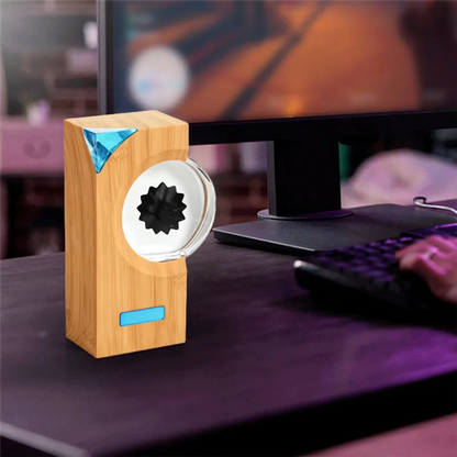 A sleek bamboo a15i ferrofluid music rhythm speaker with transparent circular front and blue accent magnetic liquid pickup details