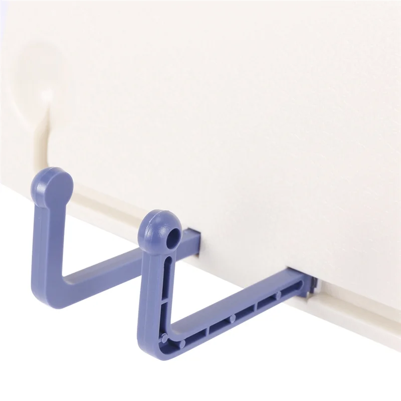 Blue plastic over-the-door shoe organizer with two curved hooks and central bar shown on back of folding tabletop music stand abs holder for piano violin universal use