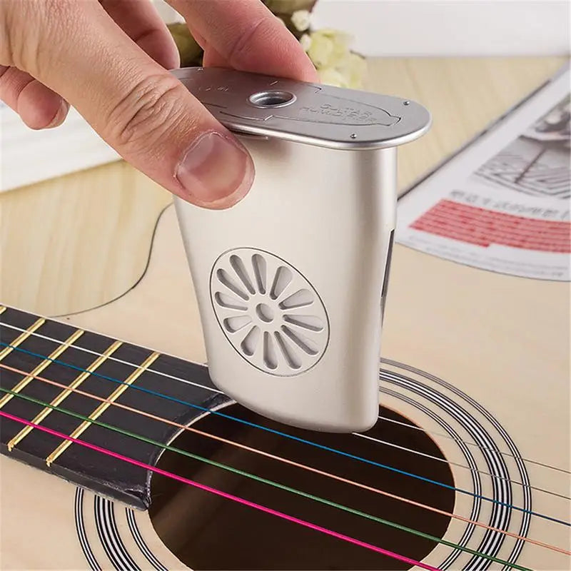 Silver metallic sound hole humidifier with circular vented design for cracking instrument care and adjustment guitar accessories