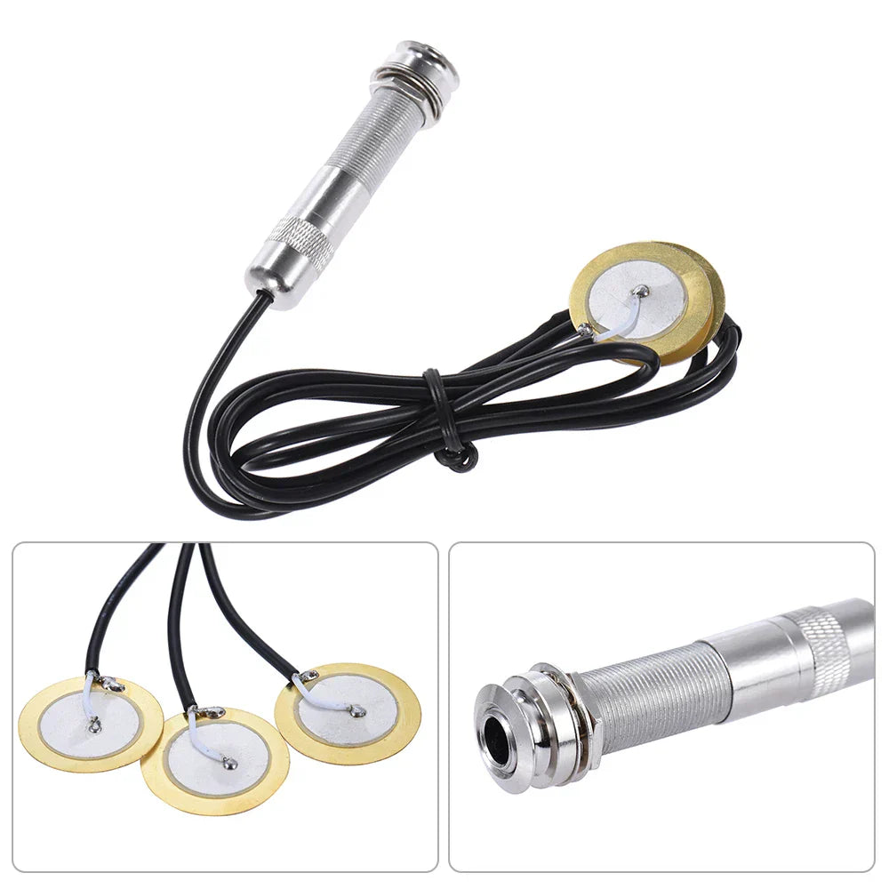 Silver metal piezo pickup with gold base and black cable for acoustic string instrument guitar mandolin ukulele type beat music