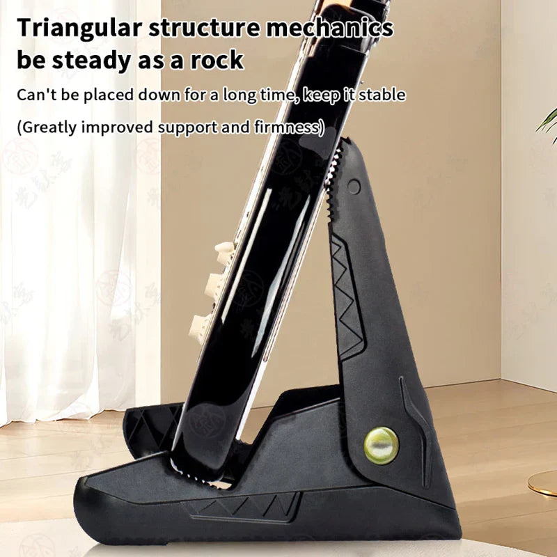 Black plastic adjustable a-frame guitar stand with tripod folding design and non-slip rubber feet for electric guitars