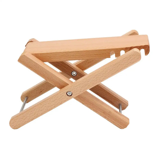 Light-colored wooden adjustable guitar foot stool with metal hardware for classical guitar home studio use