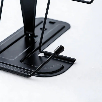 Black metal adjustable portable folding bookend with sleek minimalist design and rounded edges for books recipe shelf use