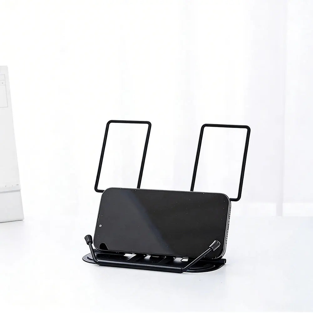 Black metal adjustable portable folding bookend stand with two upright supports and curved base holding smartphone