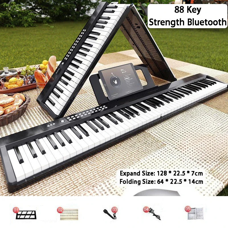 Black and white 88-key foldable bluetooth keyboard with built-in tablet stand and keyboard microphone interface