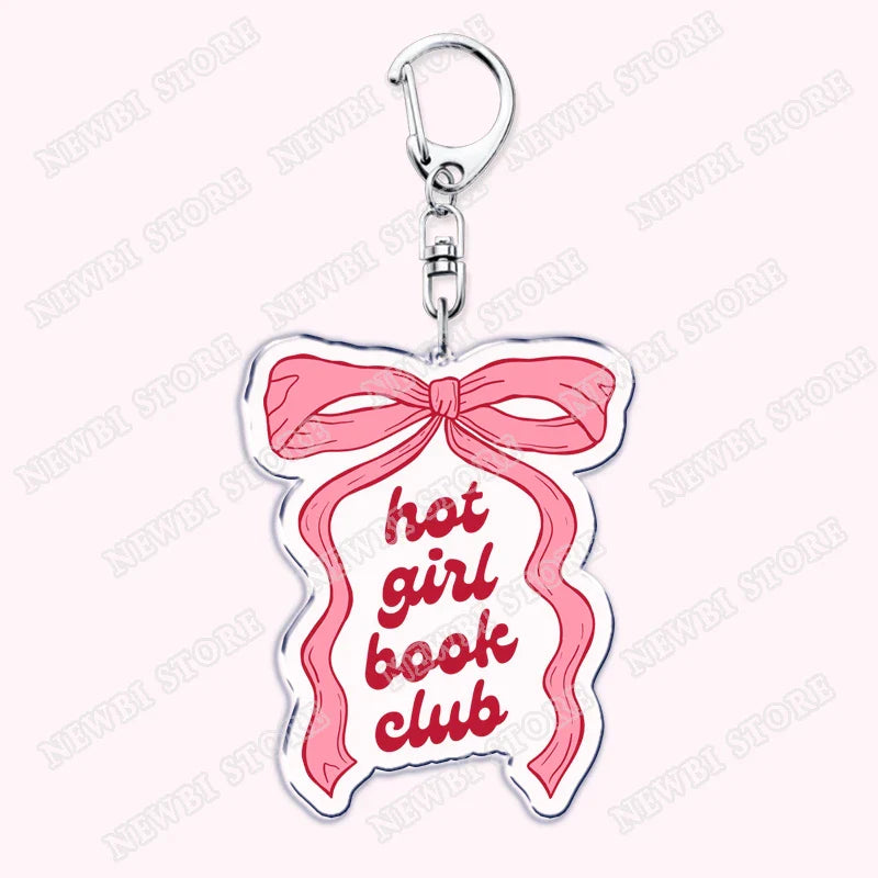 Pink ribbon-themed acrylic keychain with hot girl book club text in red script for womens accessories ribbon gifts