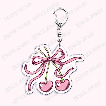 Pink cherry-shaped keychain with a bow made of clear acrylic for aesthetic coquette pink womens accessories ribbon and hot girl book use
