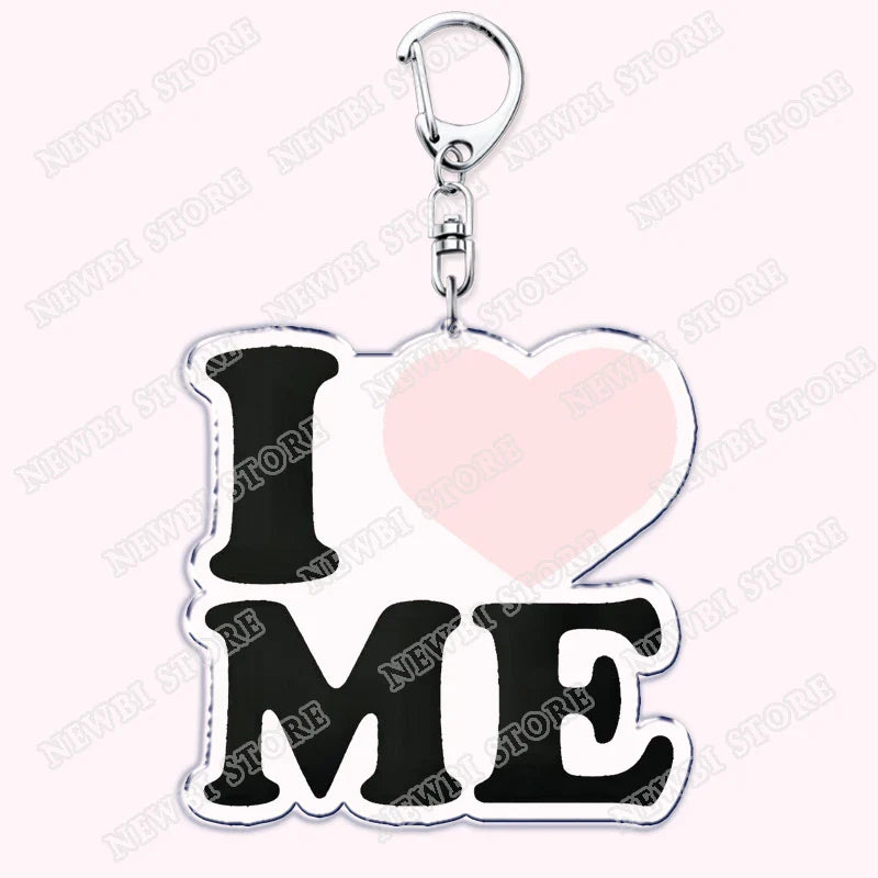 Silver-accented i heart me keychain with black lettering pink heart metallic finish aesthetic coquette pink womens accessories ribbon