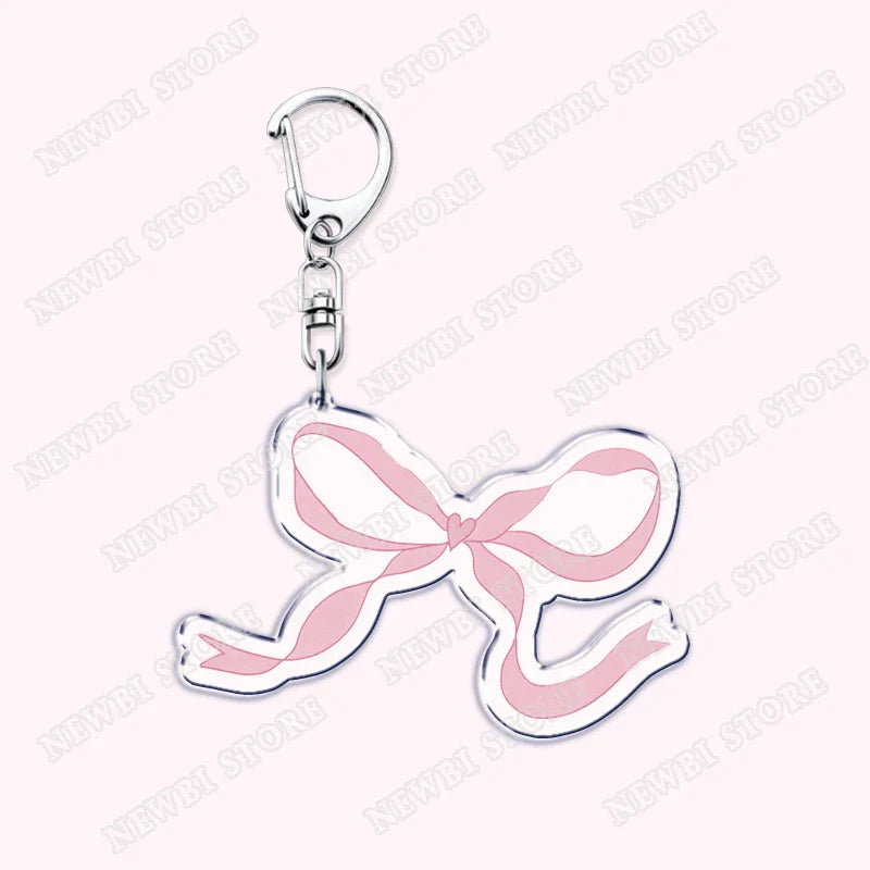 Aesthetic coquette pink keychain with shiny silver metal clasp and womens accessories ribbon bow for hot girl book club gifts