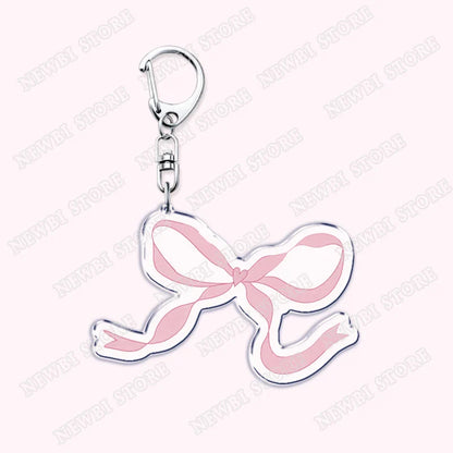 Aesthetic coquette pink keychain with shiny silver metal clasp and womens accessories ribbon bow for hot girl book club gifts