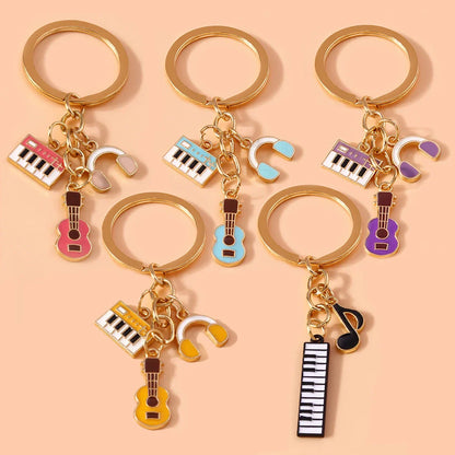 Gold-toned aihua enamel musical instrument keychains with colorful keyboard guitar headphones and music note charms for women girls diy