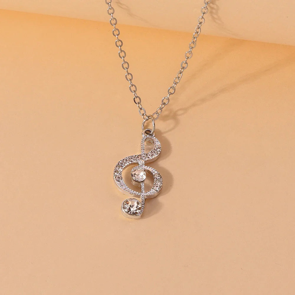 Silver musical note pendant necklace adorned with delicate crystal music crystals from aihua gold silver korean collection