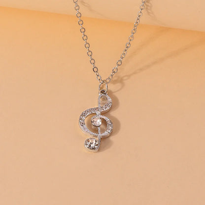 Silver musical note pendant necklace adorned with delicate crystal music crystals from aihua gold silver korean collection