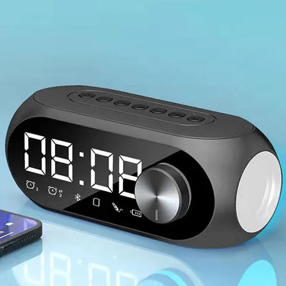 Black digital alarm clock radio with sleek design and silver rotary dial featuring fm bluetooth speaker portable subwoofer