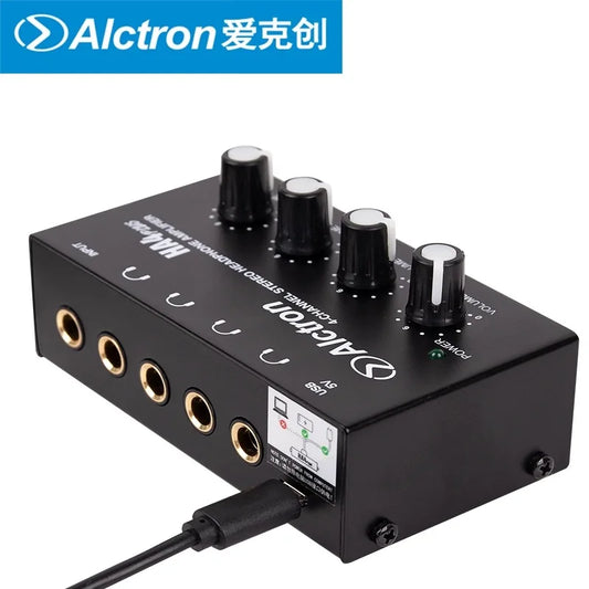 Black Alctron HA4plus mini headphone amplifier with four black knobs and gold-plated jacks for studio headphone splitter