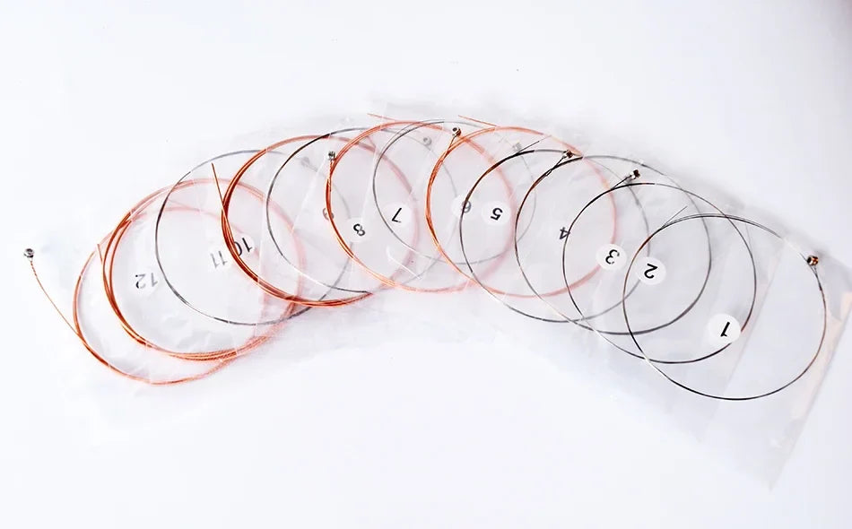 A set of ten clear plastic-wrapped alice a2012 coated copper alloy acoustic guitar strings for musical instrument guitar use