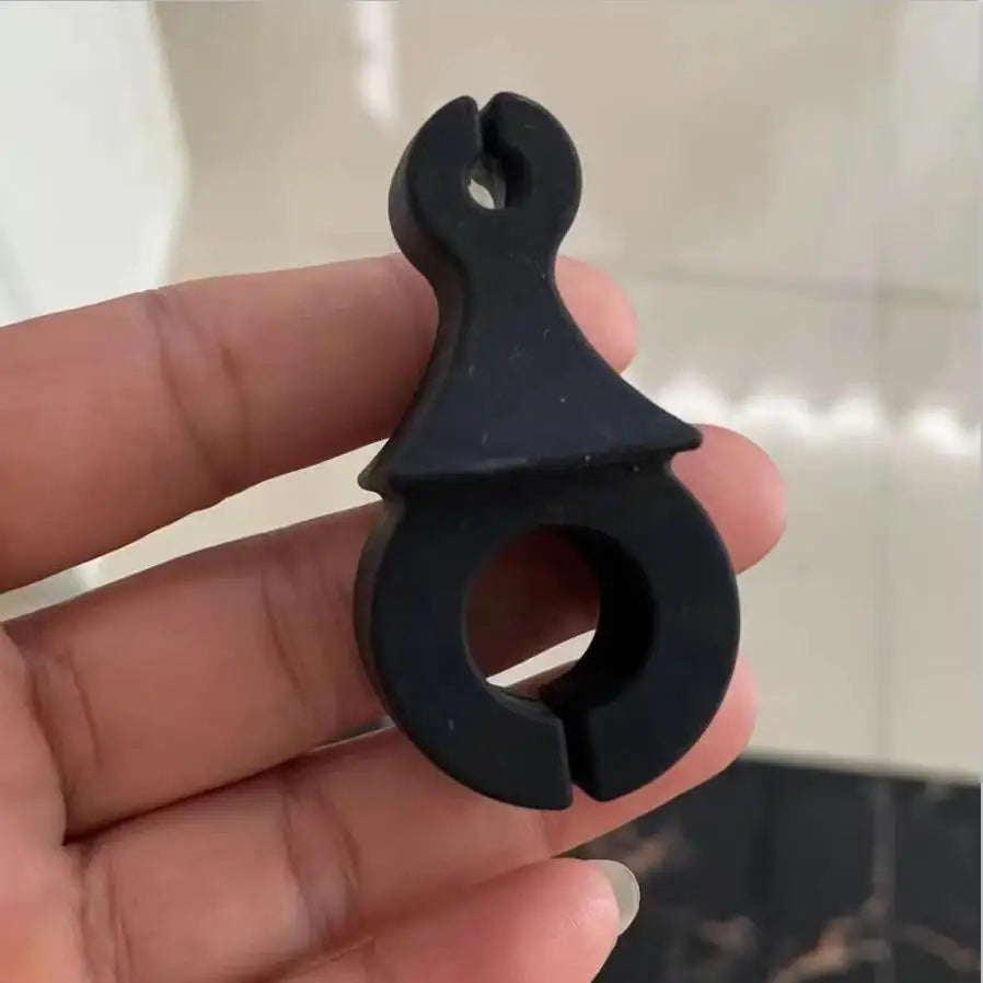 Black rubber bike handlebar grip holder designed for mic clamps stringed and microphone clips violin use