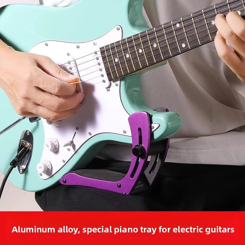 A vibrant purple aluminum alloy electric guitar practice stand portable with adjustable anti-slip piano tray design