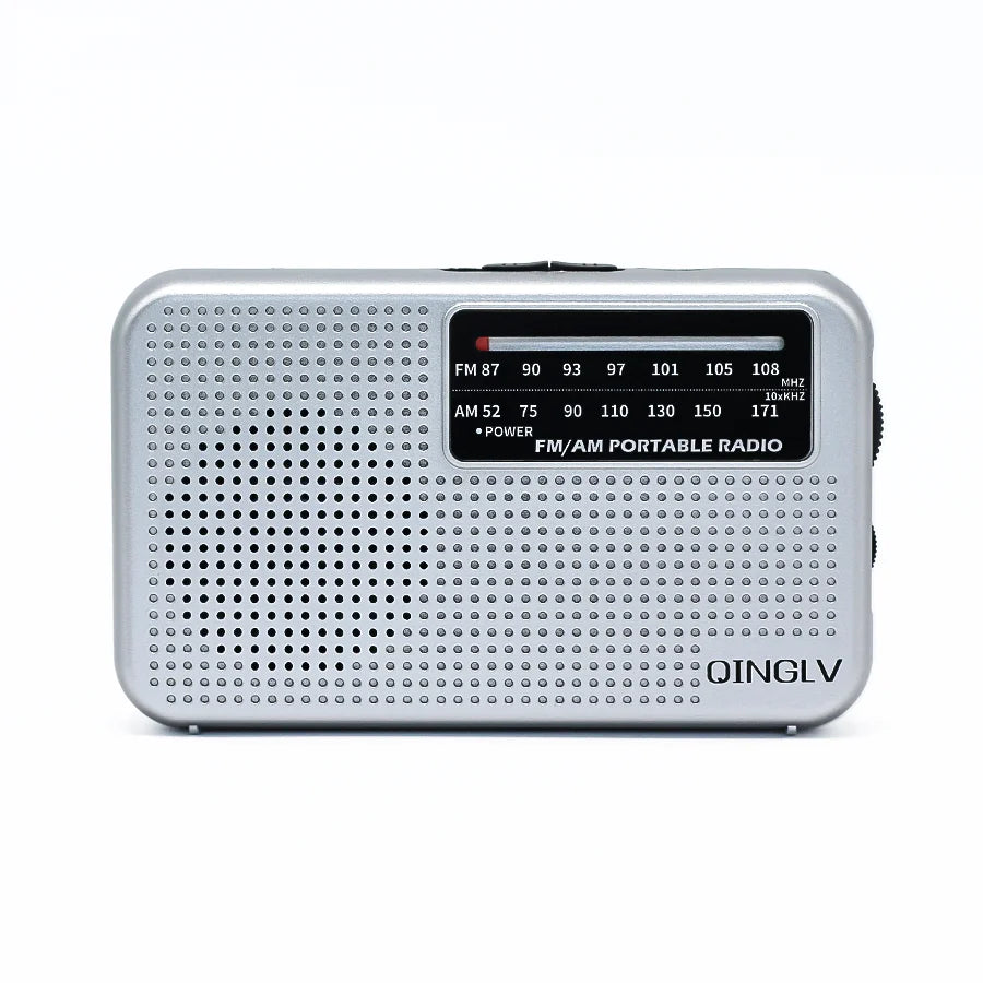 Silver am fm portable radio with perforated metal body and black frequency dial for high sound quality use