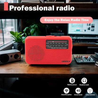 Bright red qinglv am fm portable radio with perforated plastic casing and analog dial for high sound quality