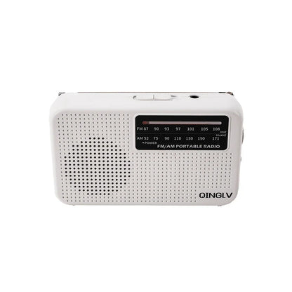White am fm portable radio with high sensitivity, perforated front panel, black frequency dial, and durable no 7 battery use