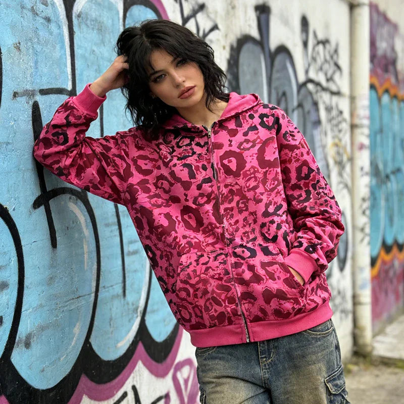 A vibrant pink leopard-print hoodie 2000s autumn with dark red black spots featuring ribbed cuffs for casual fashion high america hip hop