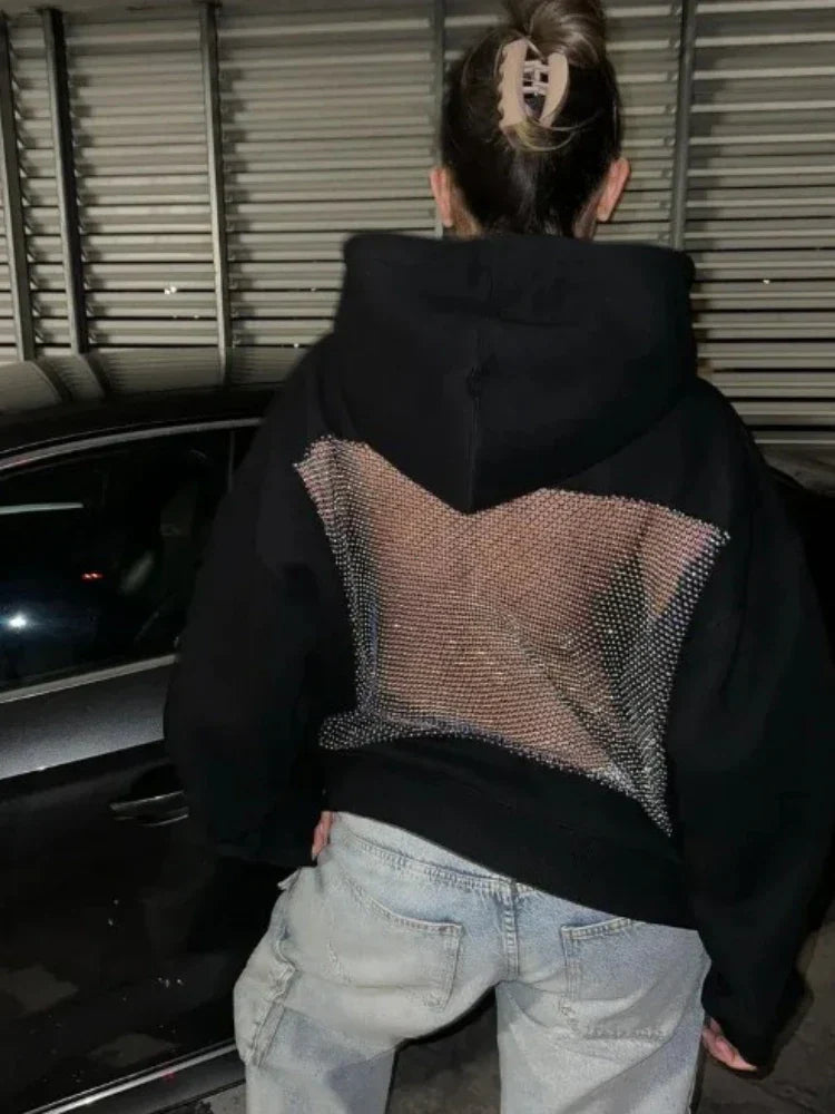 Back view of a black american gothic sexy mesh hoodie y2k with a sheer translucent panel for womens fashion casual wear