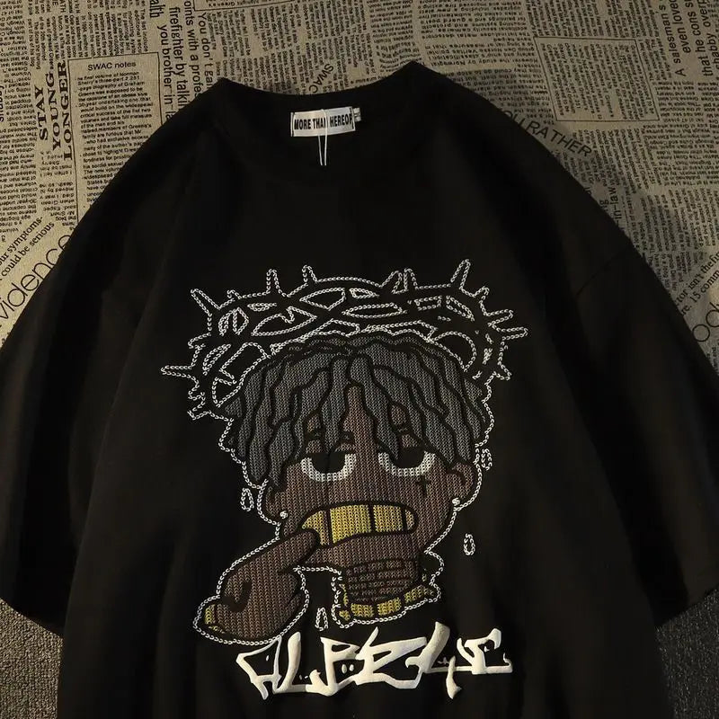 Black oversized cotton American hip hop fashion t-shirt with embroidered crowned cartoon character and stylized text