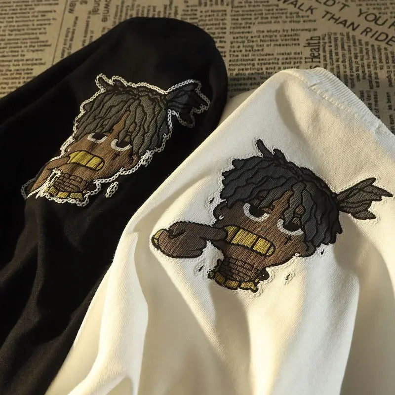 Black and white cotton t-shirts with embroidered afro cartoon characters yellow teeth for american hip hop fashion brand