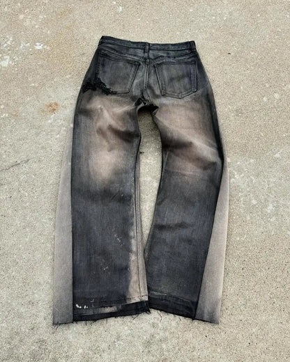 Dark gray distressed american hip hop mens jeans with waist frayed patchwork embroidery micro flared design and raw hems