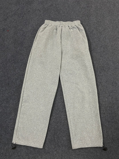 Gray heathered sweatpants with elastic waistband and ankle drawstrings featuring american hip hop personality design