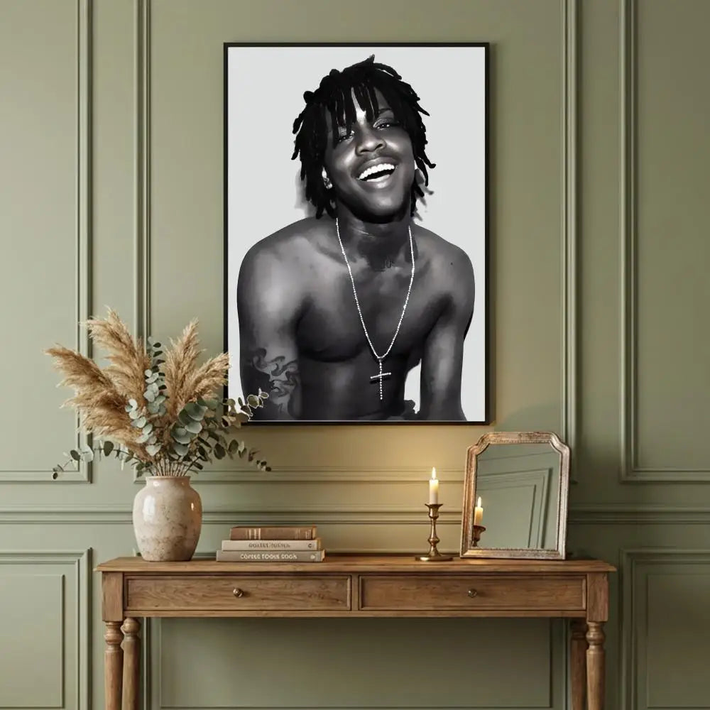 Black and white framed portrait of hip hop rapper chief keef wearing cross necklace in music retro poster design