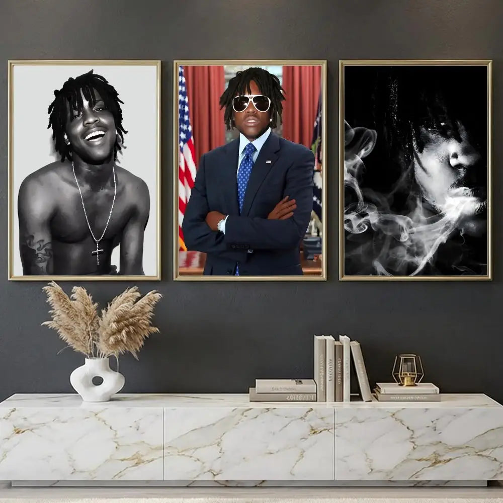 Three framed black and white and color lil yachty portraits above marble table in rapper chief keef music retro poster decor