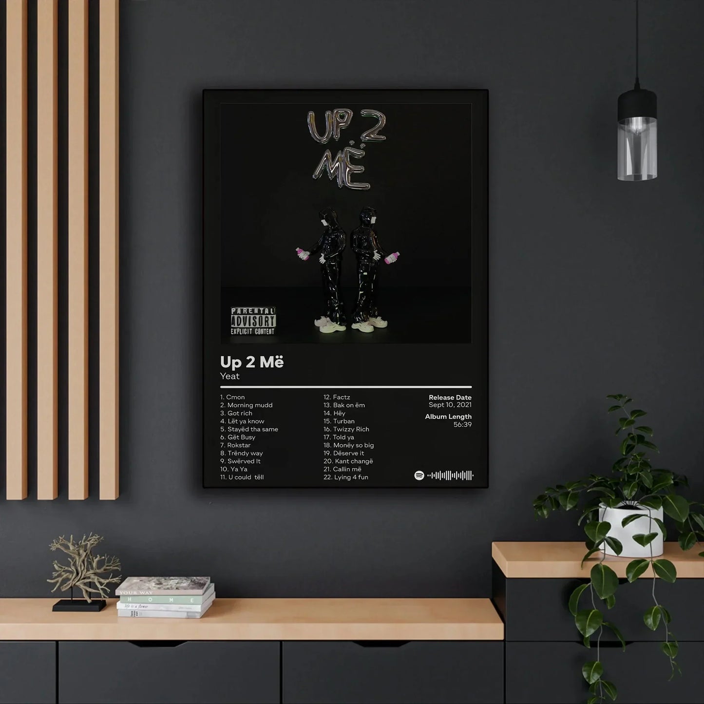 Black-framed canvas painting poster of rapper star yeat up 2 me album with tracklist and spotify logo on dark background