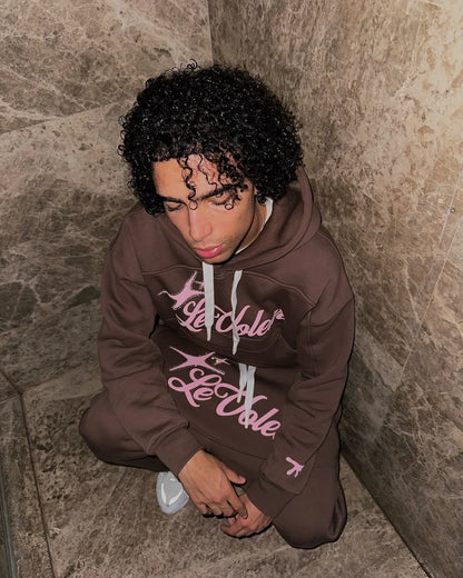 Brown le cote hoodie with pink cursive american letter graphics and white drawstrings in womens sportswear hip piece set y2k