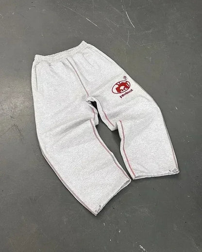 Gray heathered pants baggy sweatpants with american letter patch and red embroidered logo featuring layer design y2k style