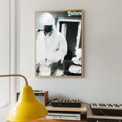 A framed black and white future album poster featuring a stylized portrait for home room rap music decor