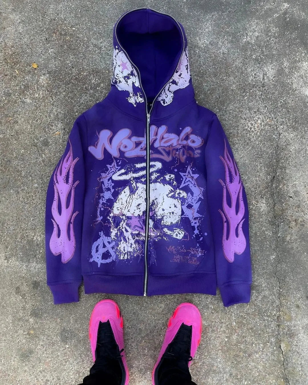 Purple zip-up hoodie with graffiti style nozhalo branding, flame sleeve graphics, and distressed skull print