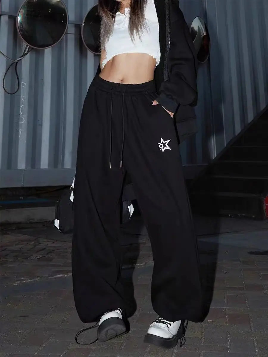 Black american retro hiphop wide leg sweatpants with white star logo and contrasting white drawstrings for casual wear