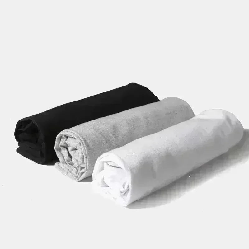 Three rolled-up soft plush fabrics in black gray and white for american street hip hop retro crew neck couple t-shirt