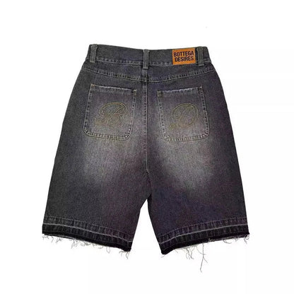 Back side of dark-wash retro denim shorts with frayed hems letter embroidery oversized and bottega veneta label american style harajuku