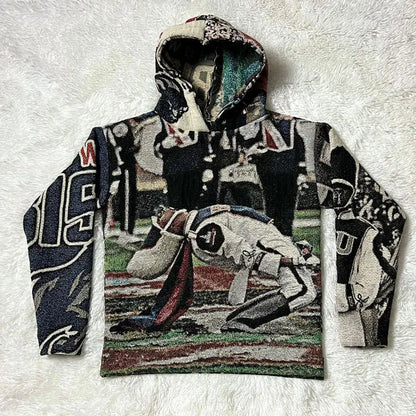 A tapestry style hooded sweatshirt featuring a detailed baseball scene in black white navy and earth tones for y2k clothes mens