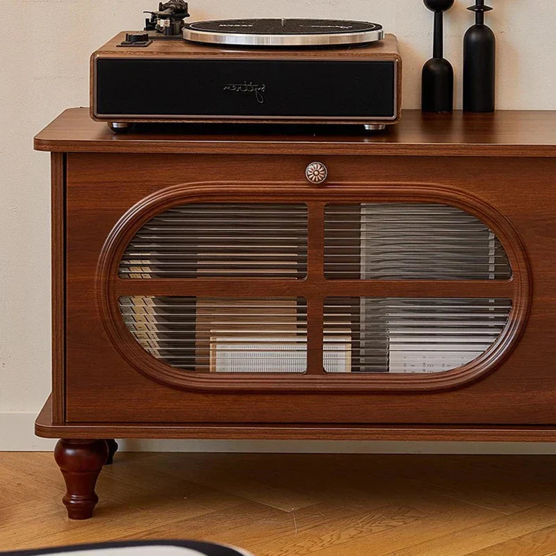A vintage tv stand featuring a mid century aesthetic with a wooden cabinet classic luxury and silver platter record player
