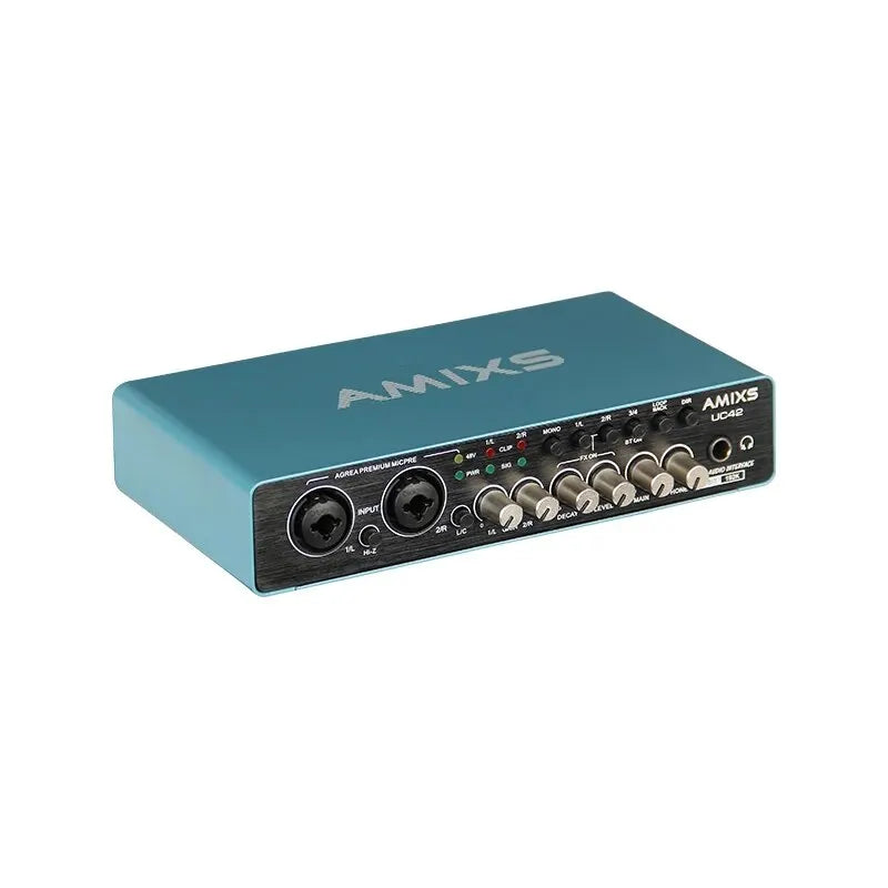 Teal amixs uc42 audio external sound card with black panel and silver knobs for professional audio equipment